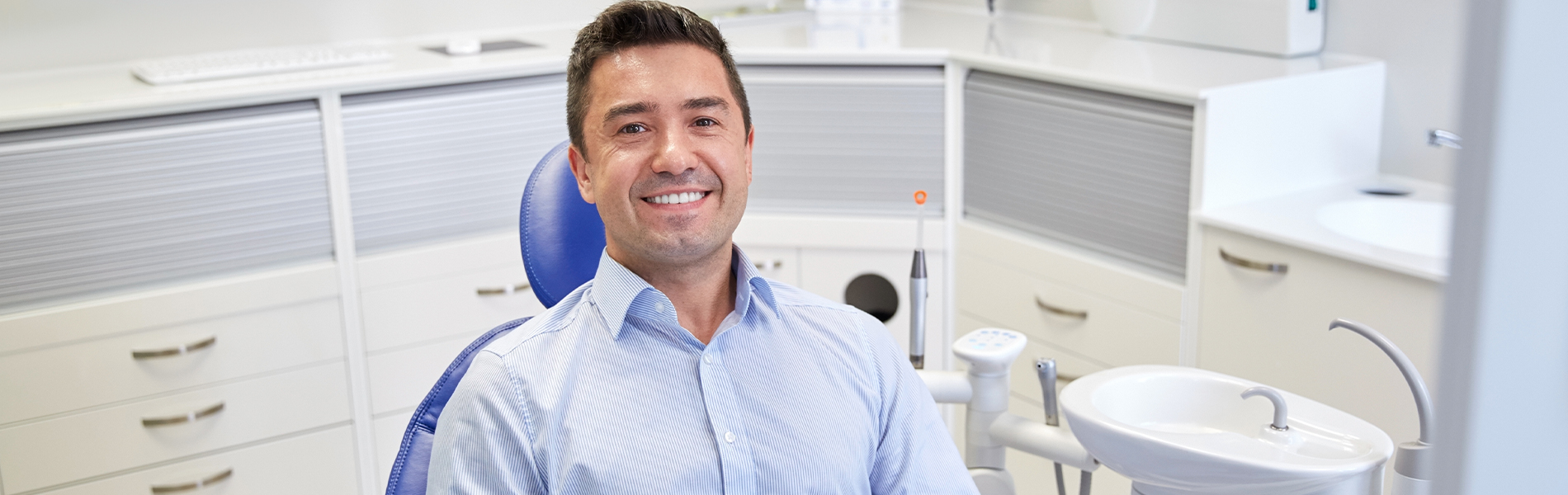 Man smiling during dental treatment